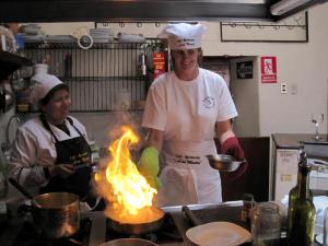 Adventure Life traveler, Amy Bergrud, learns a few local culinary secrets on our Peru Cuisine trip