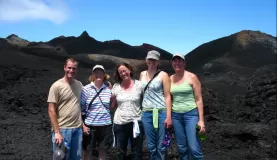 Hiking on the volcanic rock of Isabela Island in the Galapagos