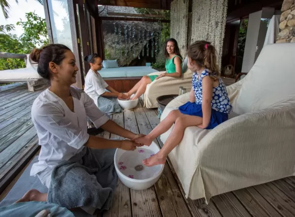 Barefoot ritual is part of the island welcome