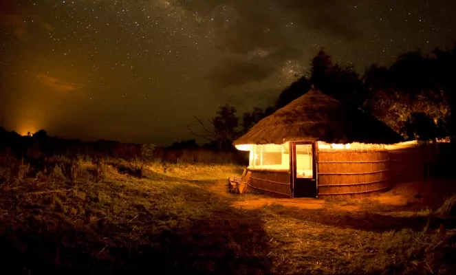 Hut exterior at night