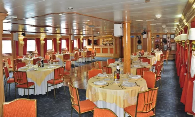 Dining aboard the small ship Skorpios III