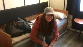 Haley, excited to unpack her bags in our hostel.