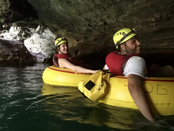 Relaxing ride along the river and through the caves