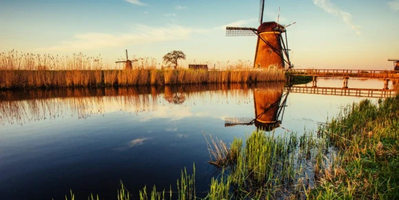 Traditional Dutch windmills from the channel Rotterdam. Holland