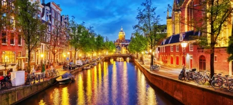 Western Church with water canal view in Amsterdam