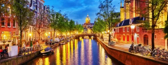 Western Church with water canal view in Amsterdam