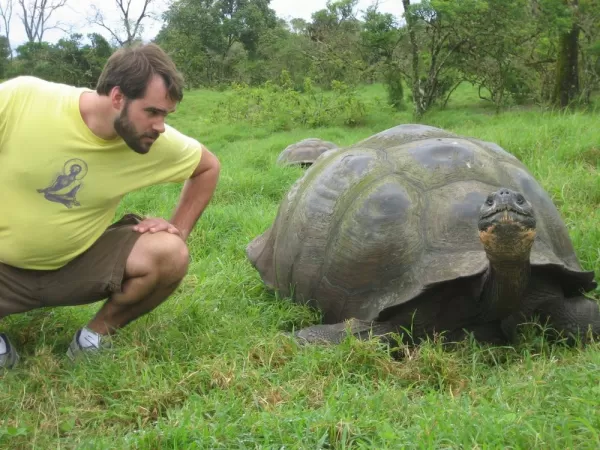 Hanging with a giant Galapagos tortoise