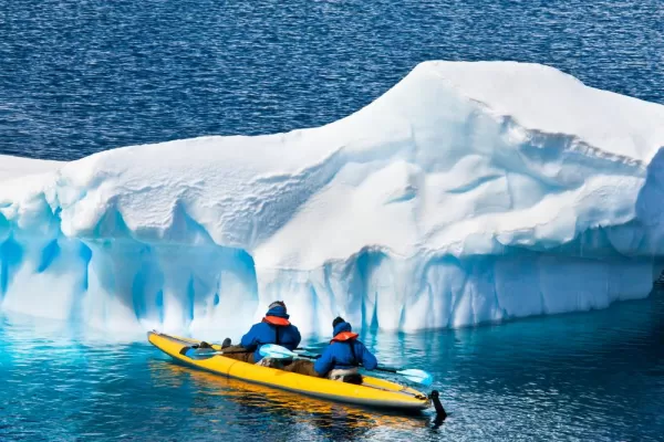 Kayaking toward an iceberg