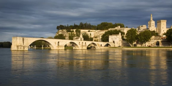 Medieval Saint-Bénezet bridge/Pont d'Avignon and Rhone River in Avignon, France