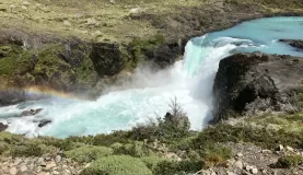 Rainbow over Salto Grande waterfalls in Torres del Paine Park