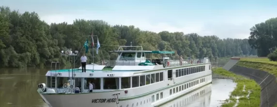 MS Victor Hugo sailing along the Tisza