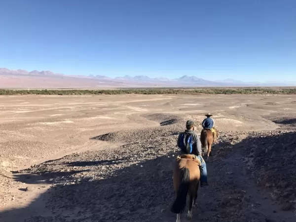 riding back down to San Pedro de Atacama valley