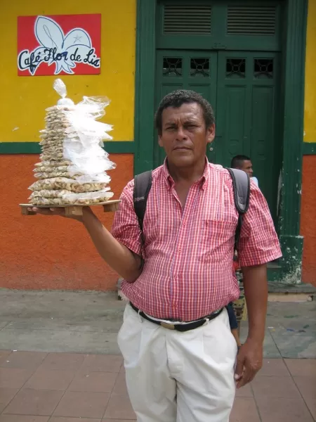 a street vendor selling nuts