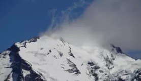 Patagonia wind blowing snow off the peaks