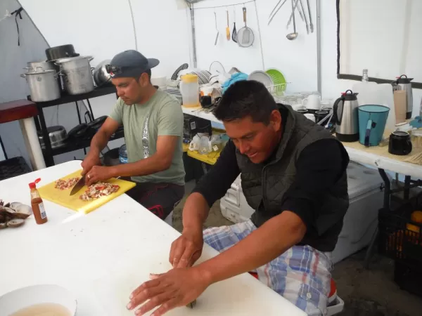 Camp staff preparing our clams