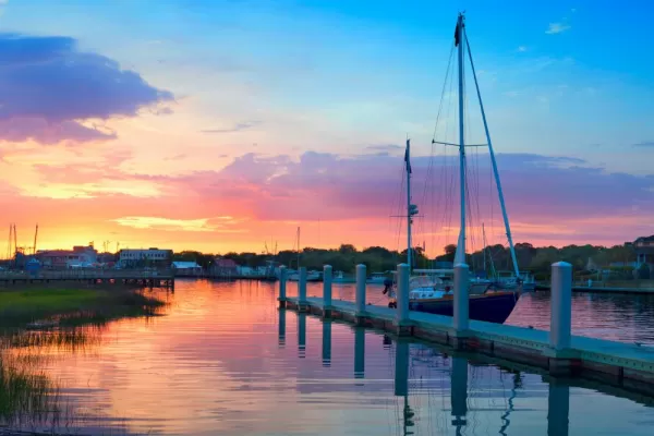 Sunrise Over A Docked Sailboat In Charleston South Carolina