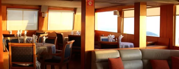 Enjoy lunch in the spacious dining room aboard the Millennium