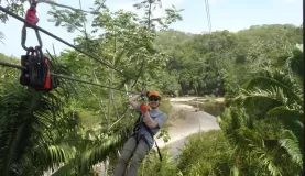 Zip-lining over the river.