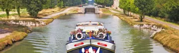 Cruise through small canals aboard Rosa