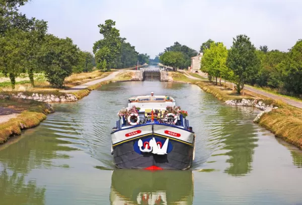 Cruise through small canals aboard Rosa