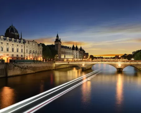Touring on Seine river in Paris with sunset