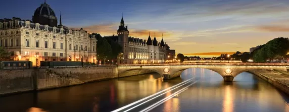 Touring on Seine river in Paris with sunset