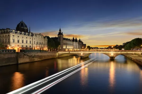 Touring on Seine river in Paris with sunset