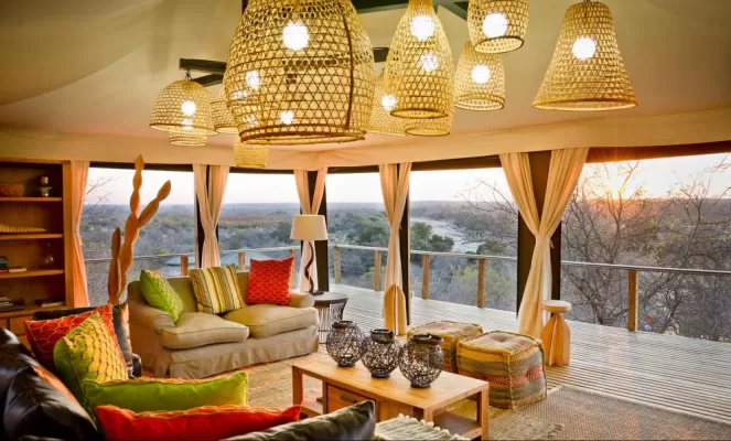 Relax in Simbavati's cosy indoor yet well-lit lounge