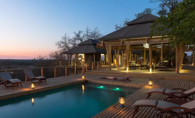 Spend your time between game drives poolside