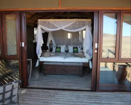 Your spacious room opens up onto the plains of the Namid desert