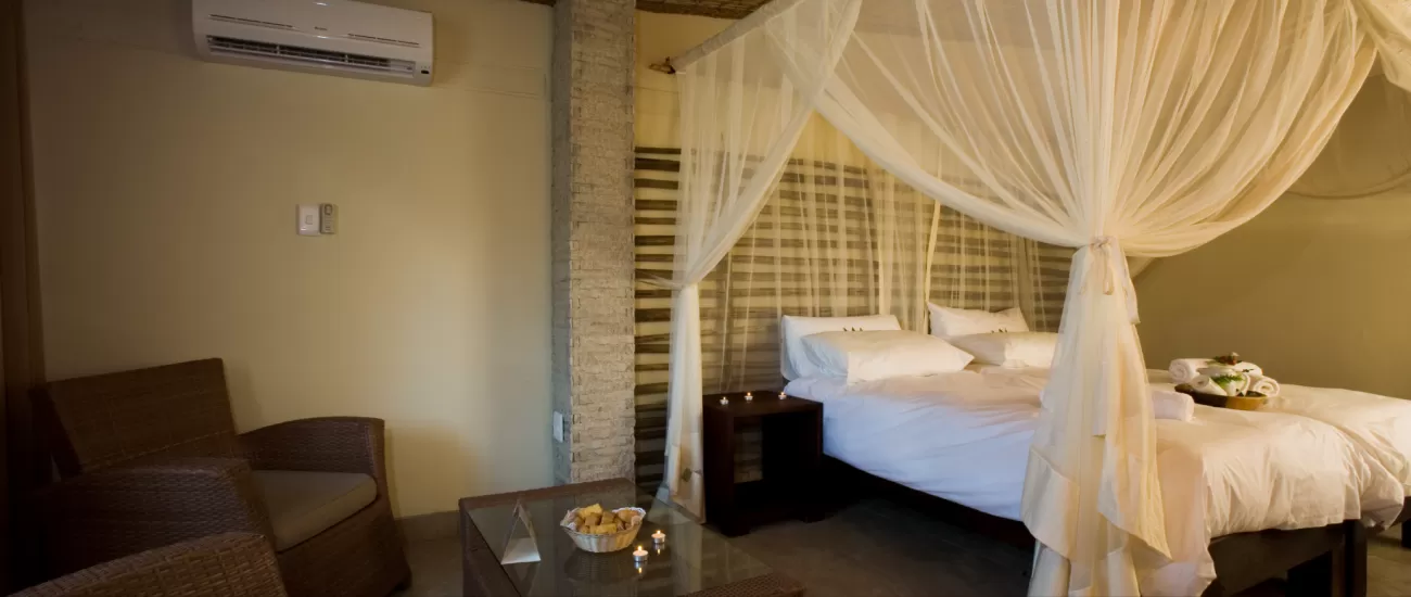 Settle into your comfortable bedroom at Okaukuejo Resort