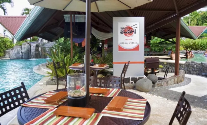 Relax at the poolside, Arenal Springs Hotel
