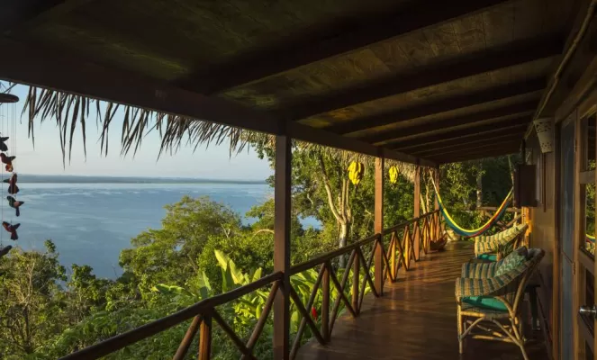 Relax on the deck of the Rainforest Casita