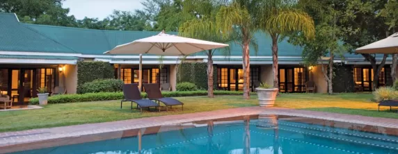 Spend time by the pool at Perry's Bridge Hollow