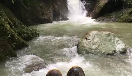 Boots and waterfall
