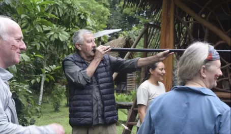 Practicing blow guns at the cultural center