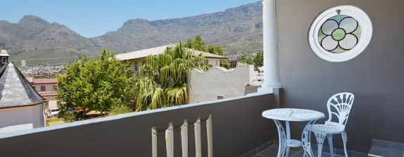 Enjoy a cup of coffee and the view of Table Mountain