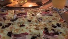 Purple corn crust pizza and local beer