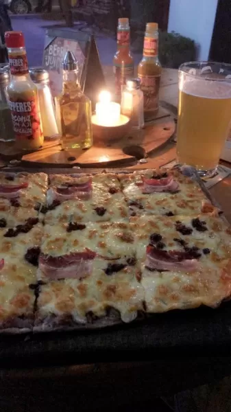 Purple corn crust pizza and local beer