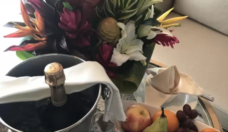 Champagne and flowers and fruit!