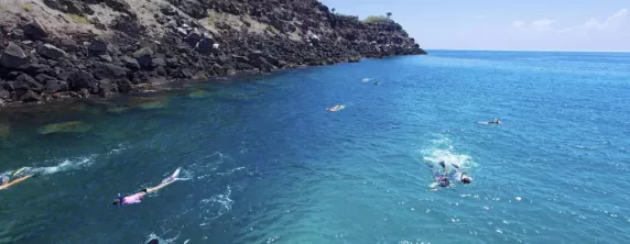 Snorkeling the tropical waters of the Galapagos islands.