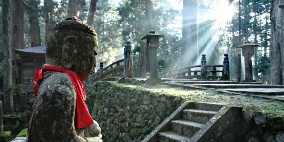 Sunlit shrine in an Osaka cemetery