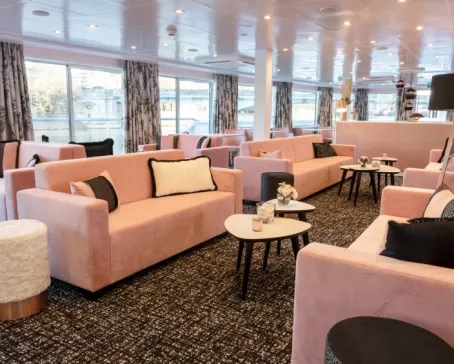 Relax in the lounge on the MS Renoir