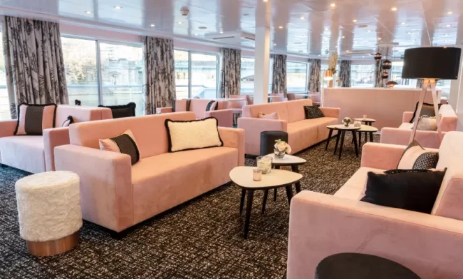 Relax in the lounge on the MS Renoir