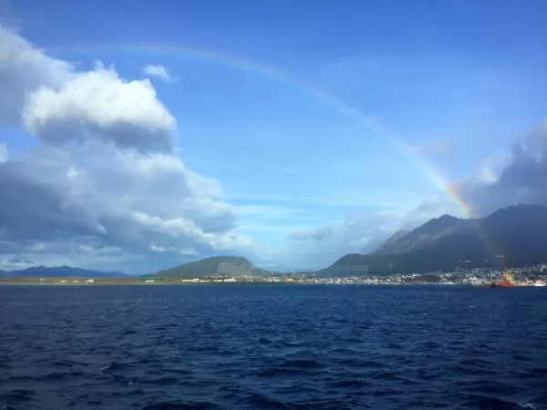 A rainbow appears over Ushuaia as we wait for the winds to die down so that we can dock the ship safely