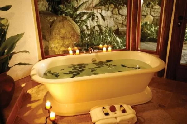 Relax in the inviting bathtub