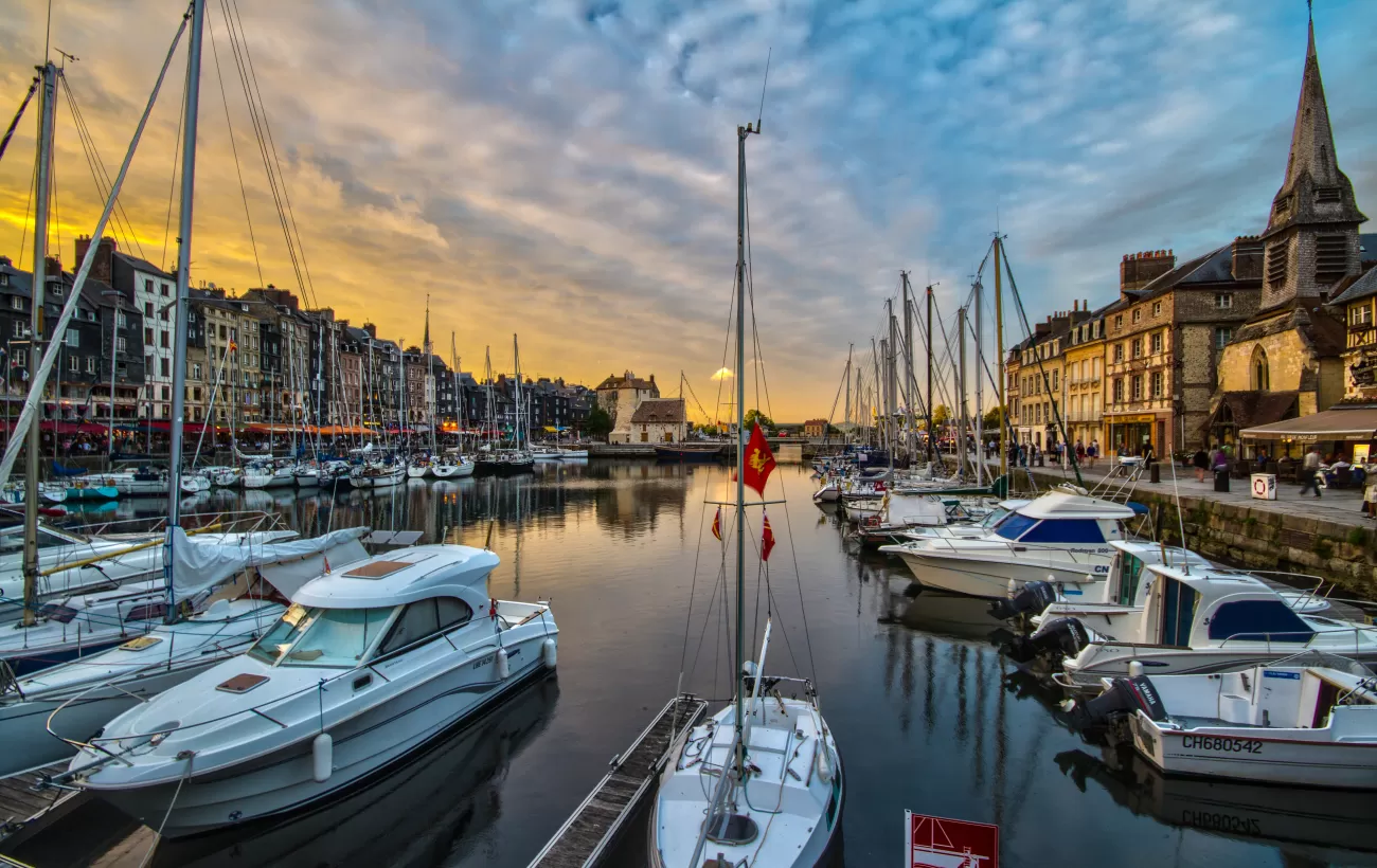 Sunset over the tranquil Honfleur harbor