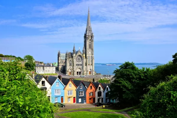 Colorful row houses and the soaring cathedral of Cork