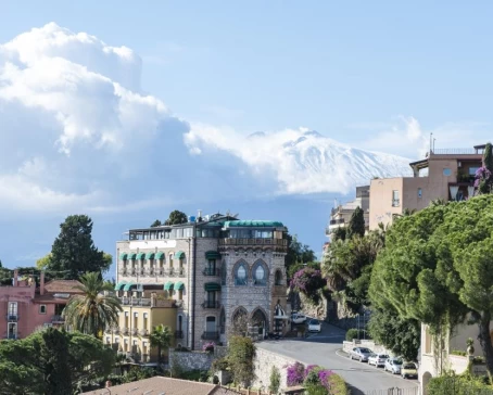 Beautiful Taormina, Italy, with Mt. Etna in the background