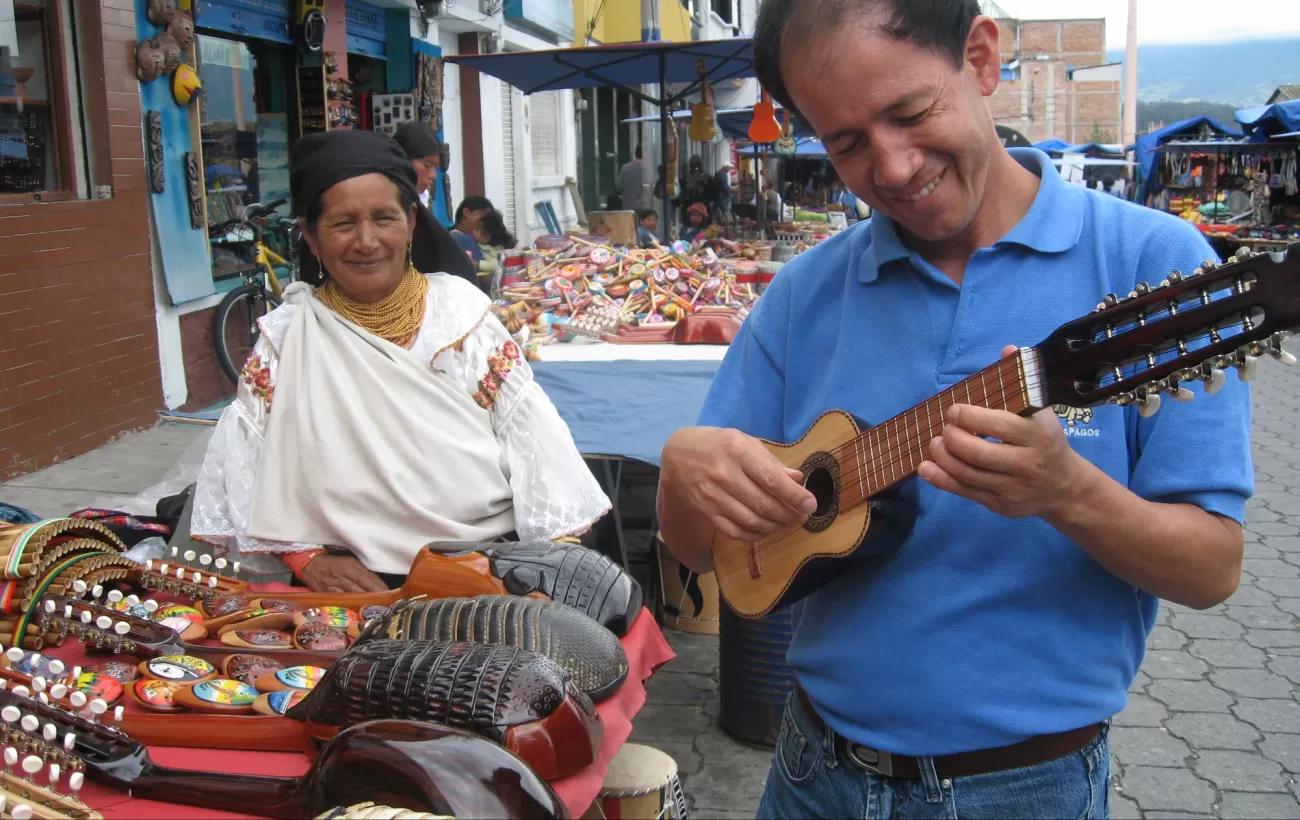 Playing a charango at the local market in Otavalo, Ecuador